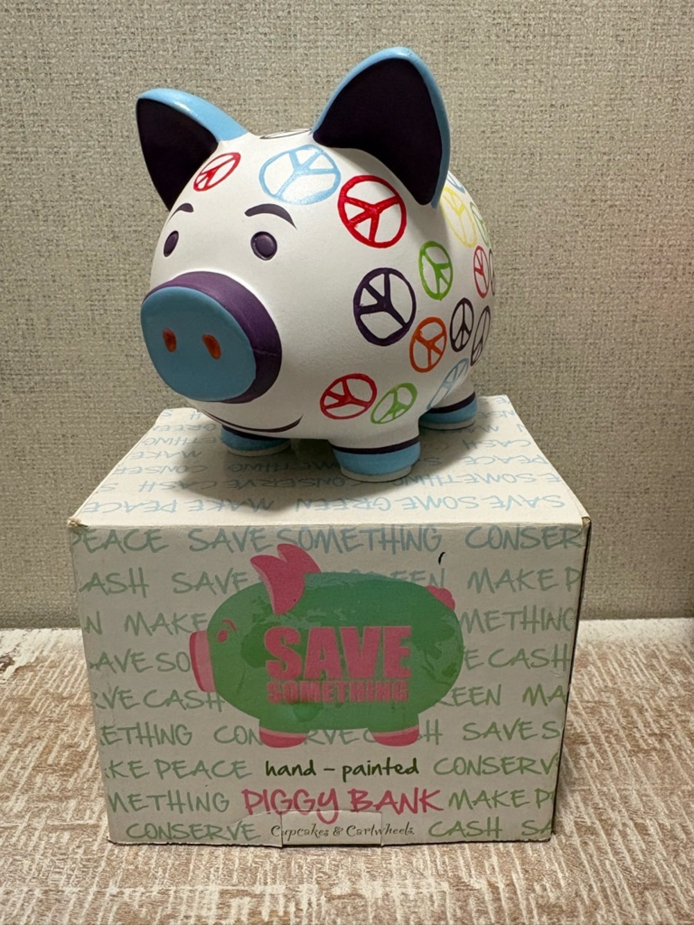 Piggy Bank with Multicolor Peace Sign Pattern
